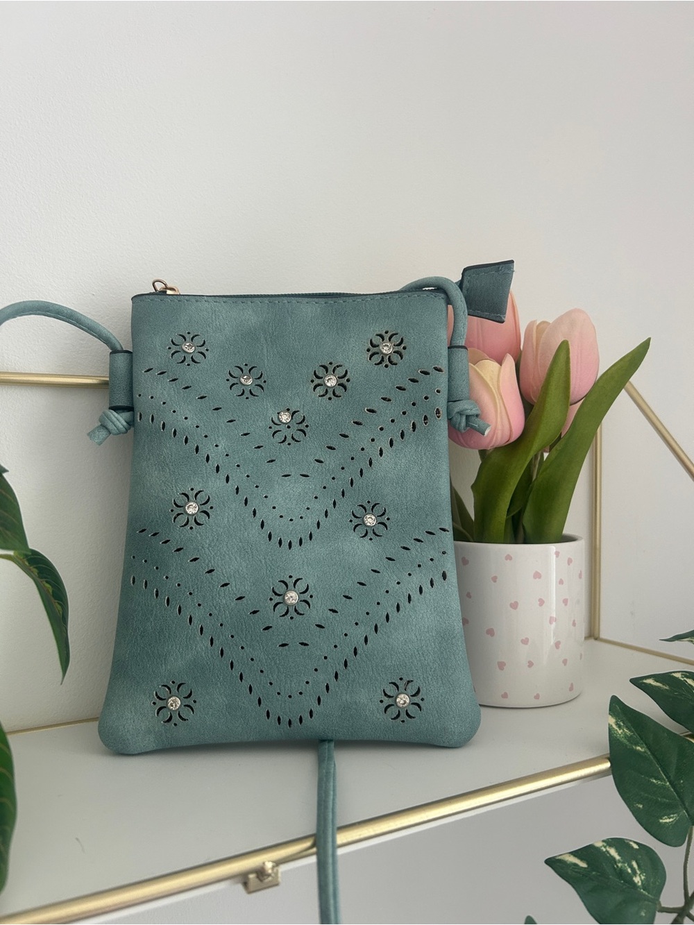 Mini Crossbody with Laser Cut and Embellished Design.